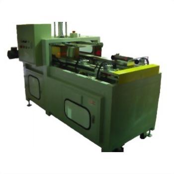 This product photo shows a light green industrial manufacturing machine with a control panel and visible internal mechanisms on a plain white background.