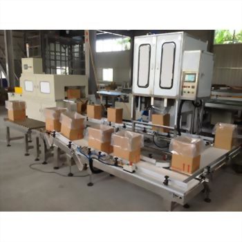 Automated industrial packaging line conveyor boxes shrink wrap machine