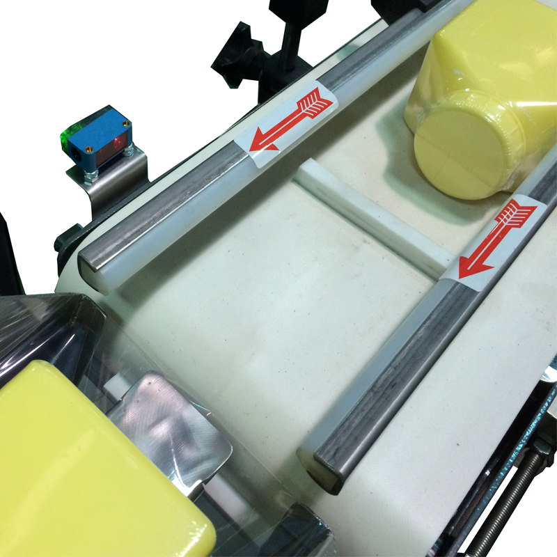 Conveyor belt product guidance sensor system