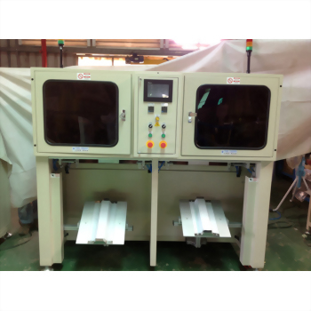 Dual station industrial packaging machine