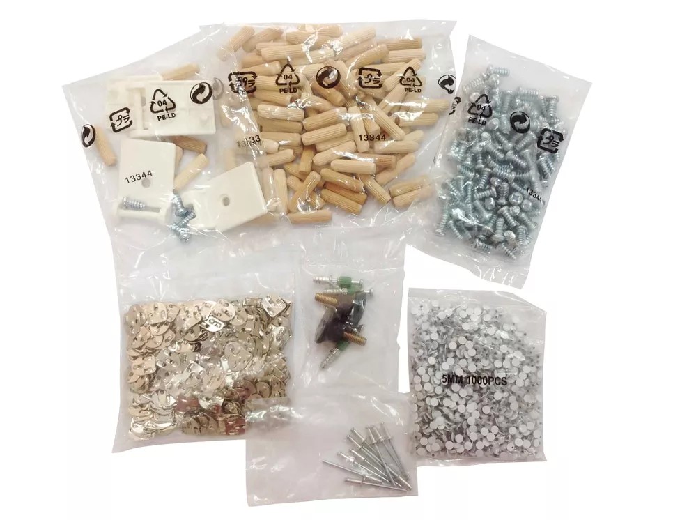 Hardware fastener kits packaged by the TC-900 sealing machine