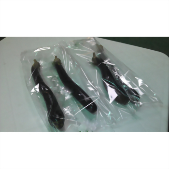 Individually wrapped dark purple eggplants