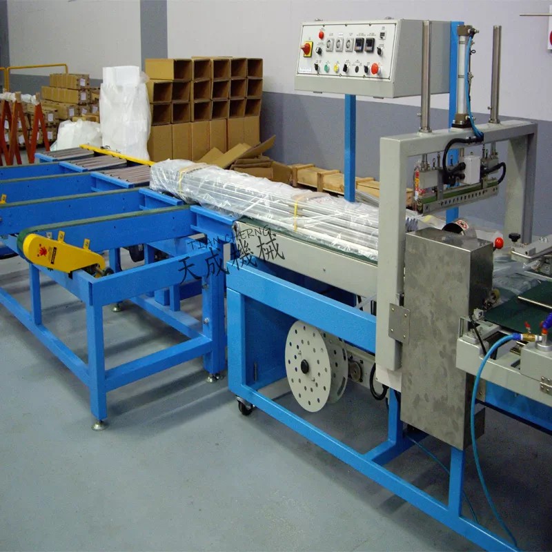 The TC-L1000S Full Auto L-Type Sealing Machine, an extra-lengthened model designed for shrink wrapping long items.