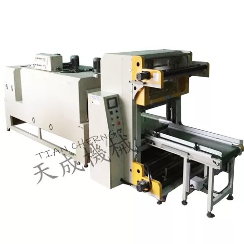 Side view of the PVC shrink machine showing the conveyor belt system and robust frame