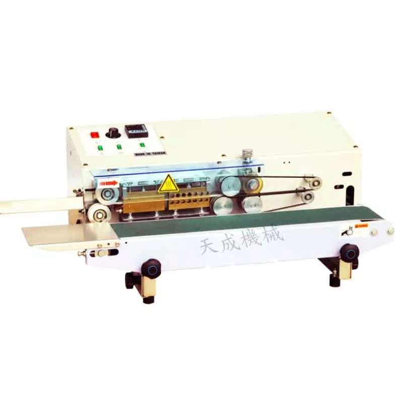 Front view of the TC-62 Mini Table Type Sealing Machine, showcasing its durable construction and control interface.