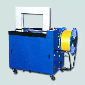 Detailed view of the TC-4530A's strapping head and feed system