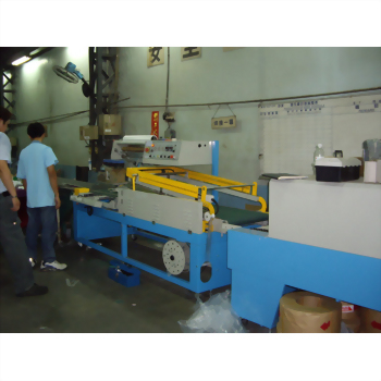 Industrial packaging machine factory workers