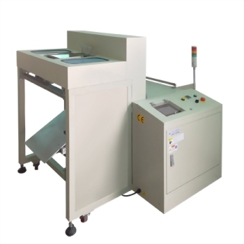 Industrial processing machine beige control panel warning lights
