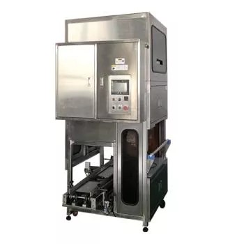 Detailed view of the TC-2100 bagging inserter's stainless steel construction and control panel.