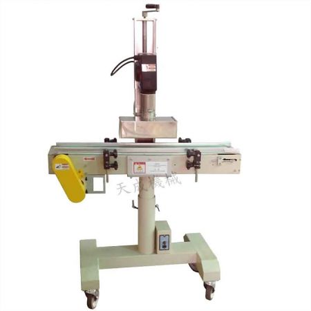 Bottle Cover Shrinking Machine - The TC-007 Bottle Cover Shrinking Machine, featuring a robust frame and adjustable heat tunnel for packaging applications.