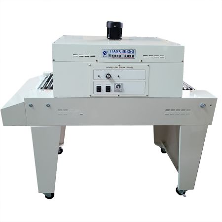 Shrink Packing Machine - Front view of the TC-40/15POF Shrink Packing Machine with its infrared ray drying tunnel, designed for industrial packaging applications.
