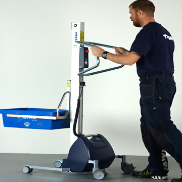 Man operating mobile ergonomic lifting device container