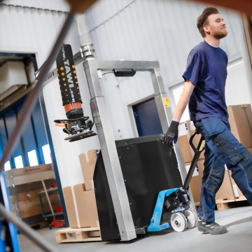 Man operating tawi mobile vacuum lifter warehouse