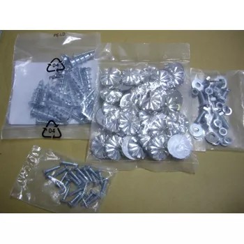 Close-up of metal fasteners and washers securely sealed in bags, demonstrating the machine's capability.