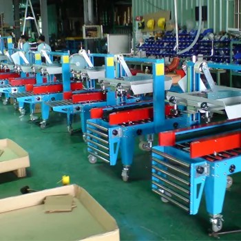 Bottom Side-Driven Carton Sealer