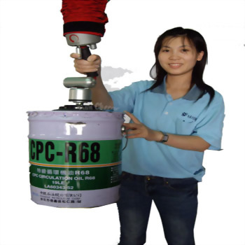 Woman demonstrates industrial lifter cpc r68 oil barrel