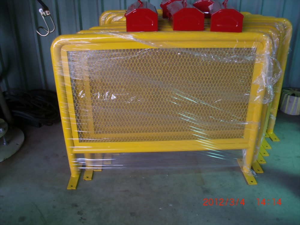 Yellow industrial safety barriers mesh red accessories wrapped
